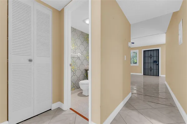 a kitchen with stainless steel appliances granite countertop a sink and a stove