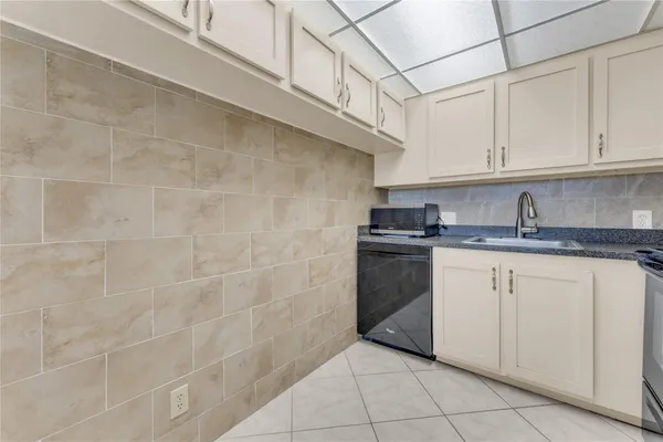 a view of hallway with wooden floor