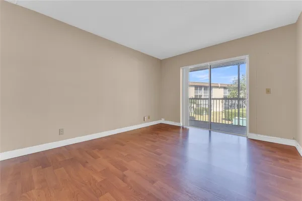 a bathroom with a bath tub with a shower