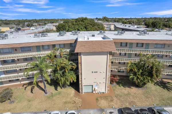 $99,000 | 300 Village Green Circle South, Unit 210, Palm Springs, FL 33461