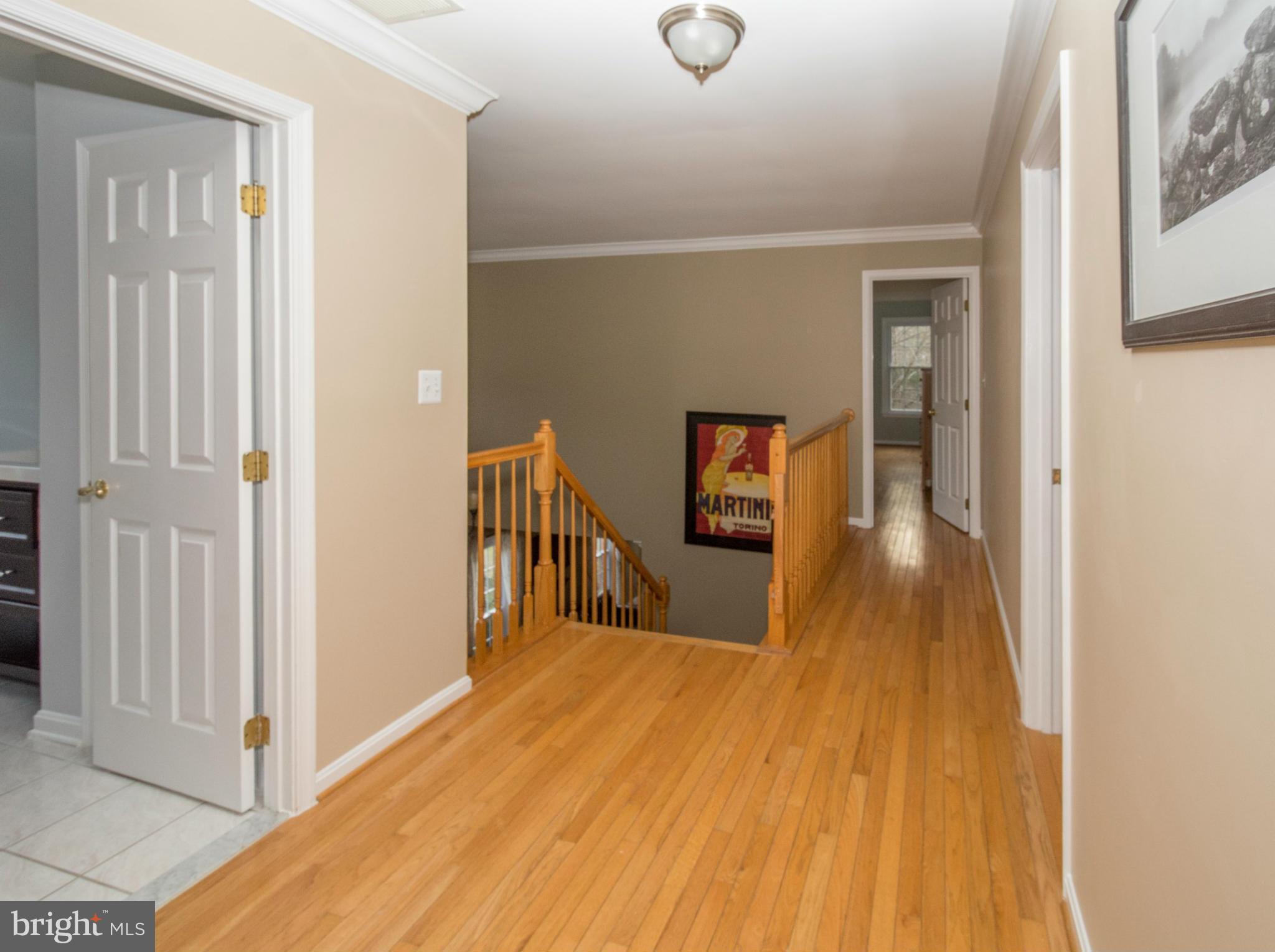 2714 Howard Grove Road Davidsonville, MD 21035 - Photo 23 of 30 Upstairs Hall with Hardwood Floors