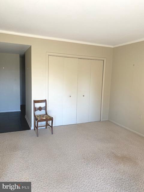 103 Cross Keys Road, Unit R103A Baltimore, MD 21210 - Photo 4 of 13 living room with closet
