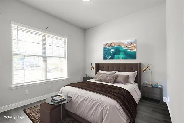 a view of a workspace with furniture and a potted plant