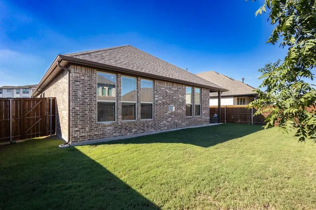 a view of a house with a swimming pool