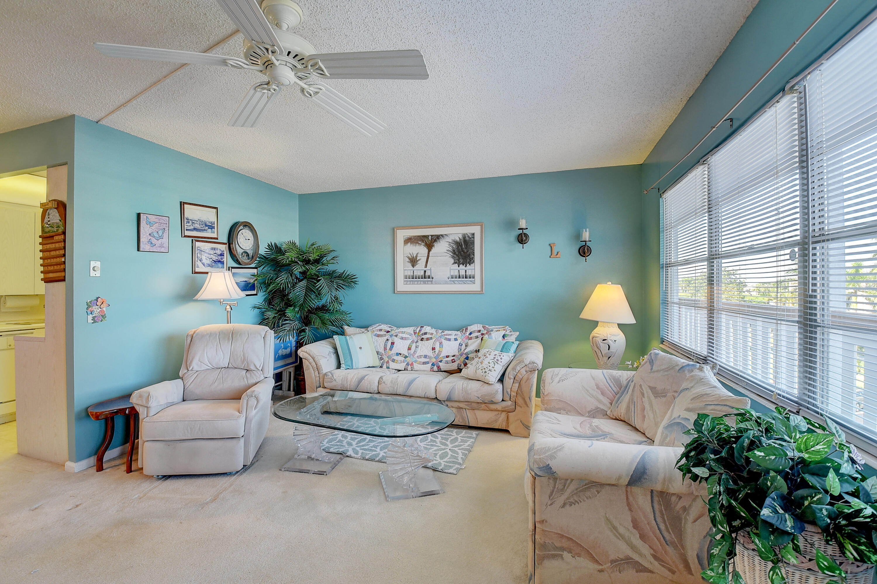4089 Cornwall East Boca Raton, FL 33434 - Photo 4 of 35 a living room with furniture and a large window