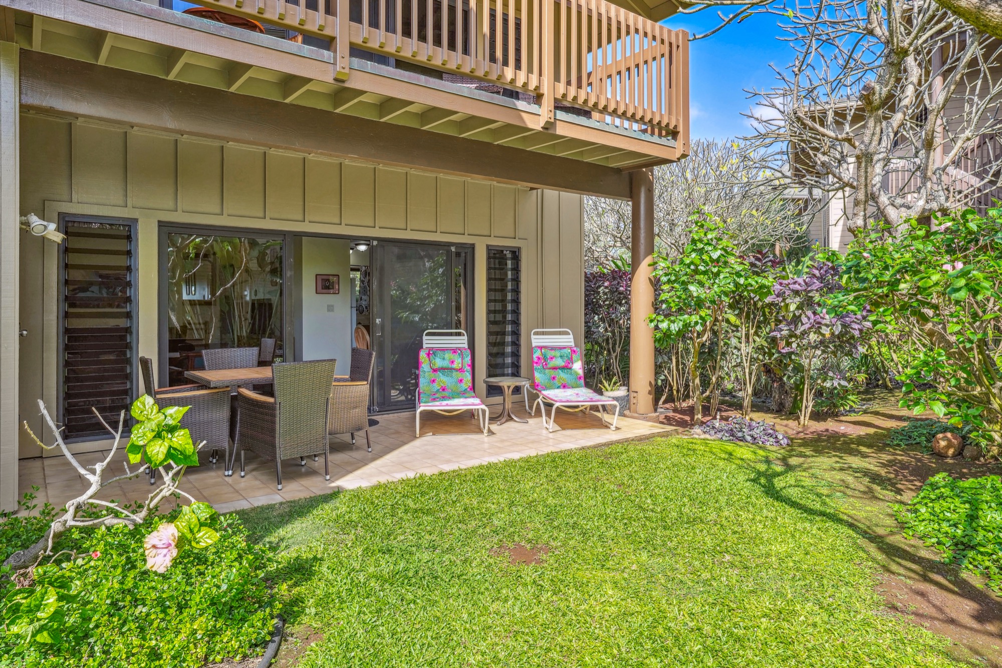 4460 Nehe Road, Unit 116 Lihue, HI 96766 - Photo 20 of 28 a view of a chairs and table in a patio