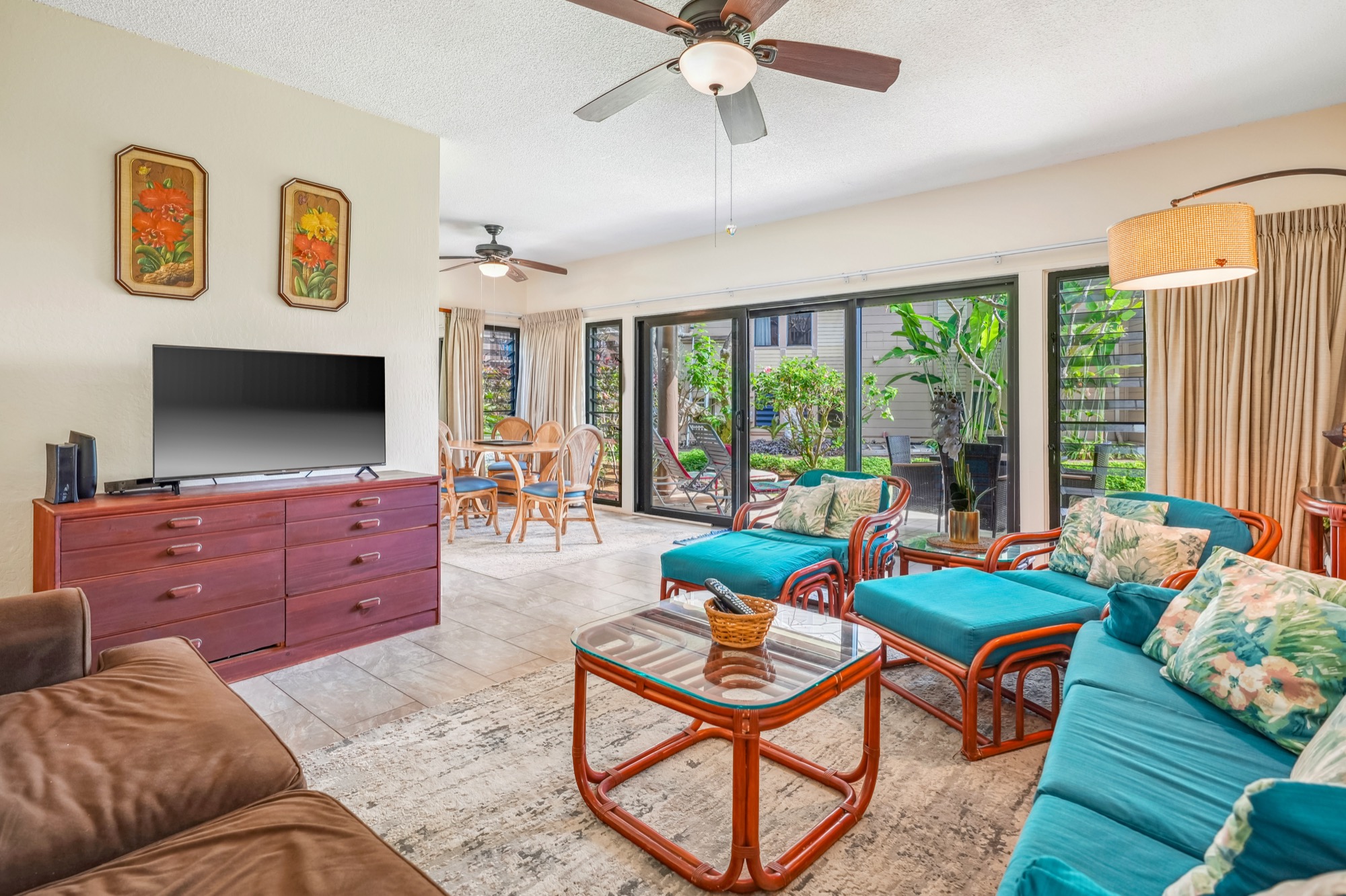 4460 Nehe Road, Unit 116 Lihue, HI 96766 - Photo 6 of 28 a living room with furniture and a flat screen tv