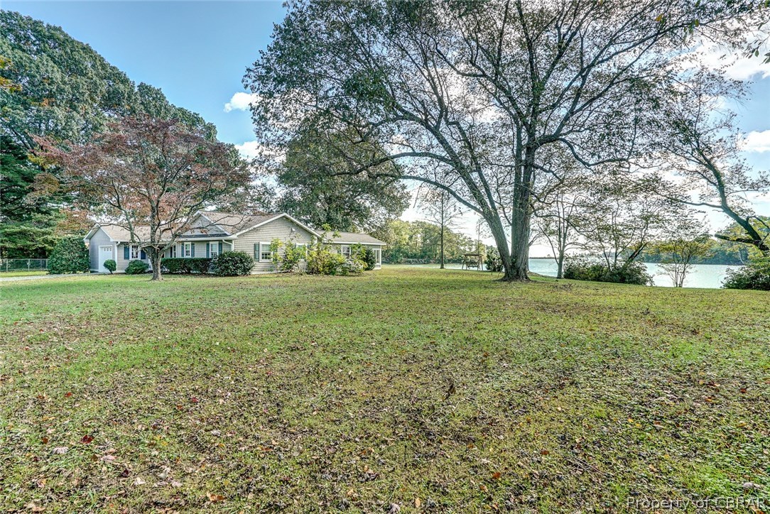 Adjacent waterfront lot next door looking towards house.