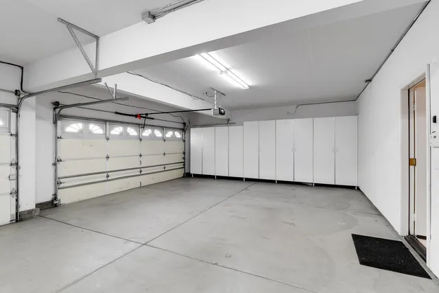 an aerial view of a house with a garden