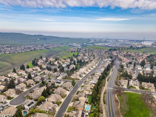 a view of a backyard with a patio