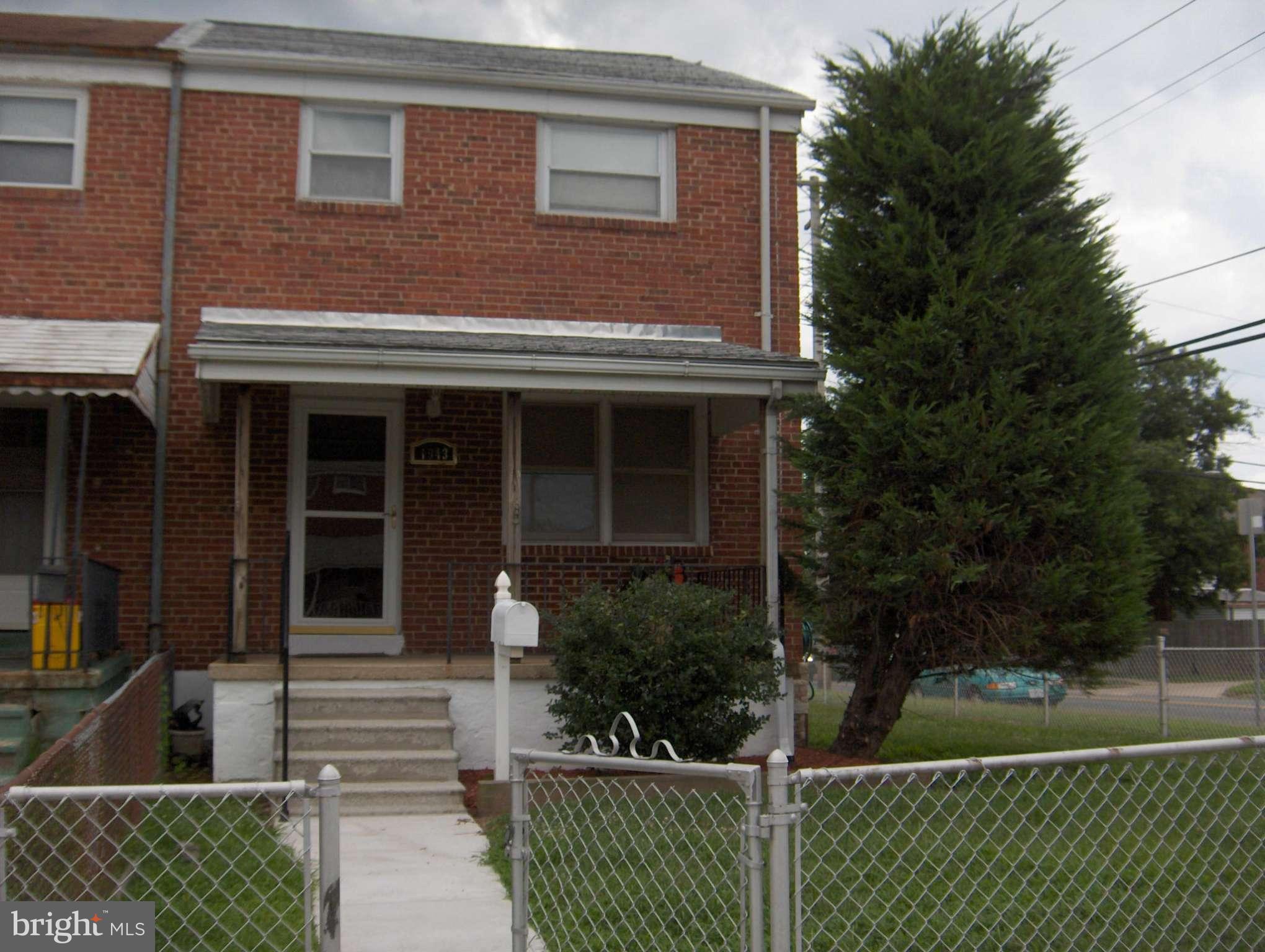 1943 Jasmine Road Baltimore, MD 21222 - Photo 1 of 29 front view of house with a yard
