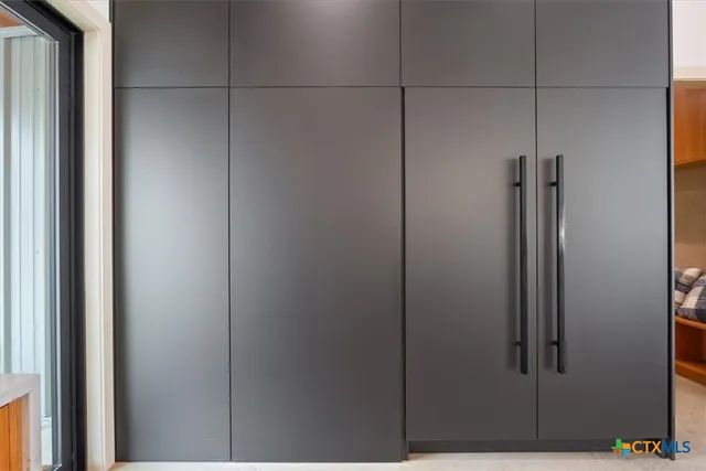 a bathroom with a bathtub and a sink