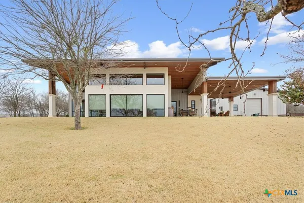 a house with yard in front of it