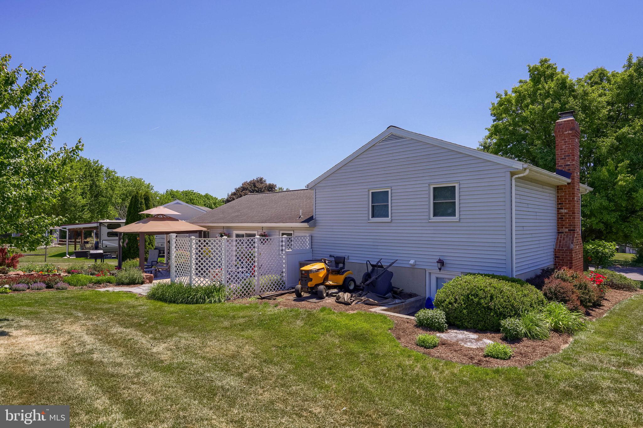 91 Buchland Road Ephrata, PA 17522 - Photo 59 of 59 Charming home with lush greenery.