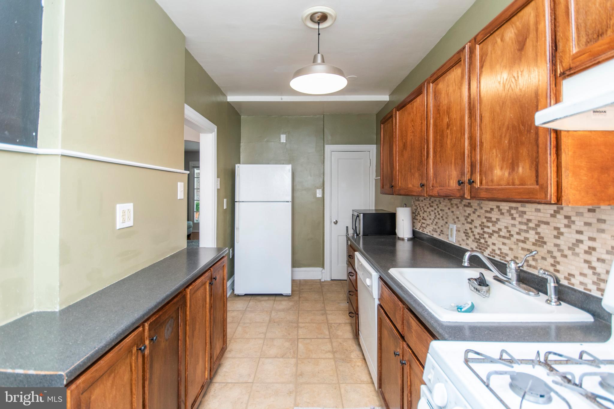 833 Atwood Road Philadelphia, PA 19151 - Photo 9 of 20 Kitchen facing basement