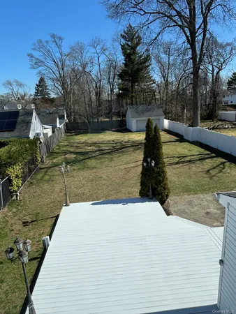 a view of swimming pool with a yard