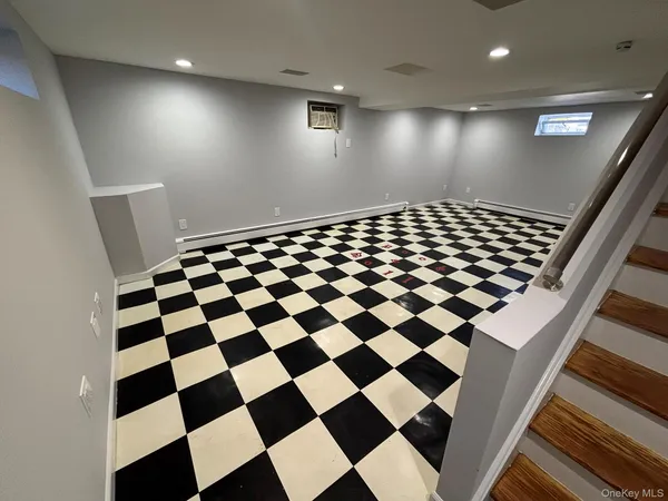 a view of a large space with a checkered floor and white checkered floor
