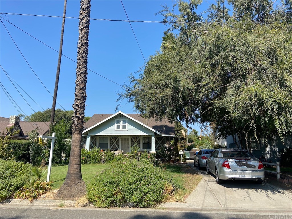 3495 Washington Street Riverside, CA 92504 - Photo 1 of 1 a front view of a house with garden
