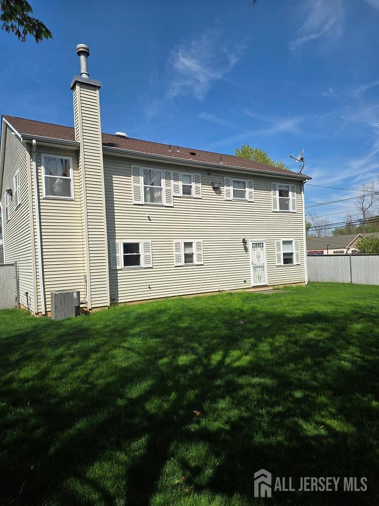 1 Wakefield Drive Edison, NJ 08820 - Photo 27 of 29 a view of a house with a yard