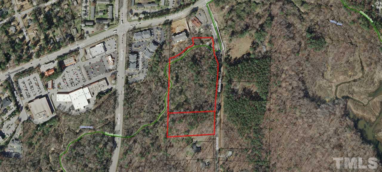 a view of a wooden wall with a tree