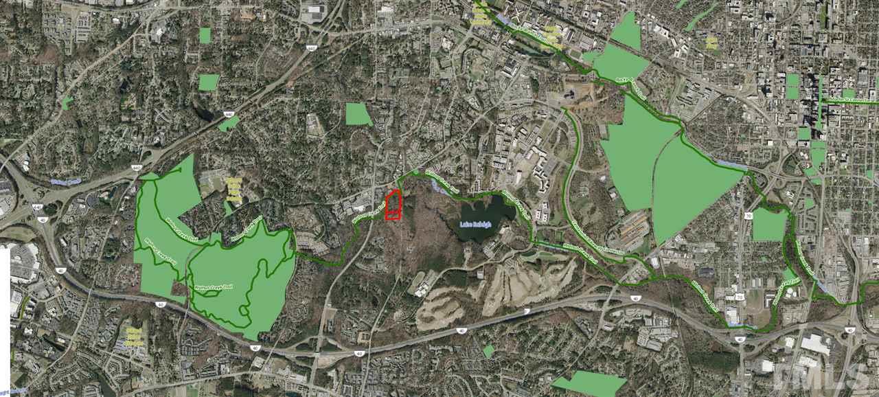 1000 Trailwood Drive Raleigh, NC 27606 - Photo 5 of 5 a green field with lots of trees