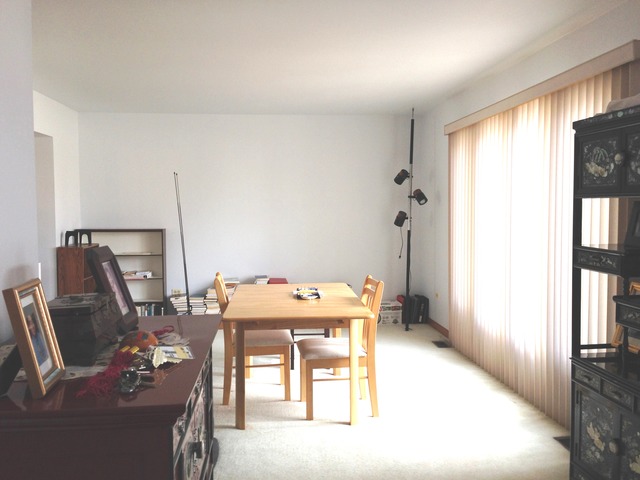 1377 Lilac Lane Addison, IL 60101 - Photo 7 of 21 a view of a workspace with furniture and a window