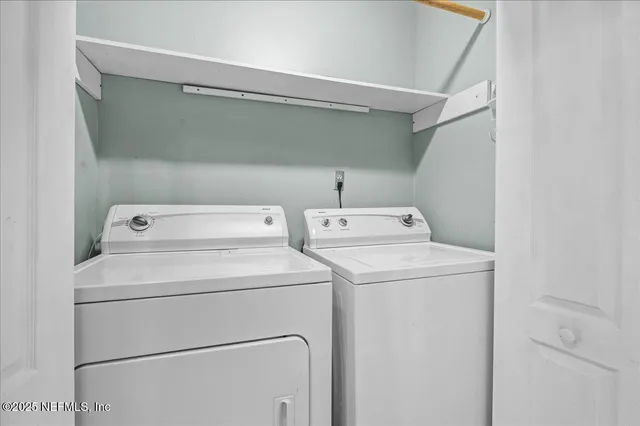 a bathroom with a toilet and a bathtub