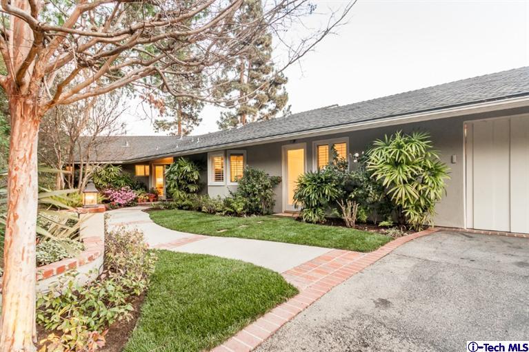 1700 Devon Road Pasadena, CA 91103 - Photo 1 of 28 a front view of a house with garden