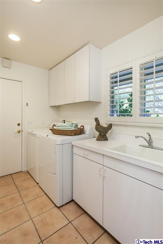 1700 Devon Road Pasadena, CA 91103 - Photo 12 of 28 a kitchen with a sink and cabinets