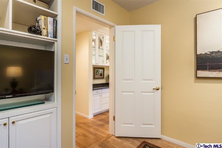 1700 Devon Road Pasadena, CA 91103 - Photo 15 of 28 a view of a living room with a flat screen tv
