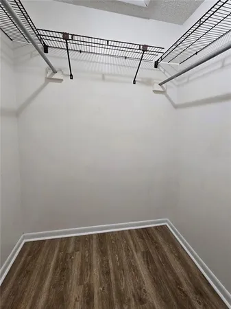 a view of a room with racks on the wall