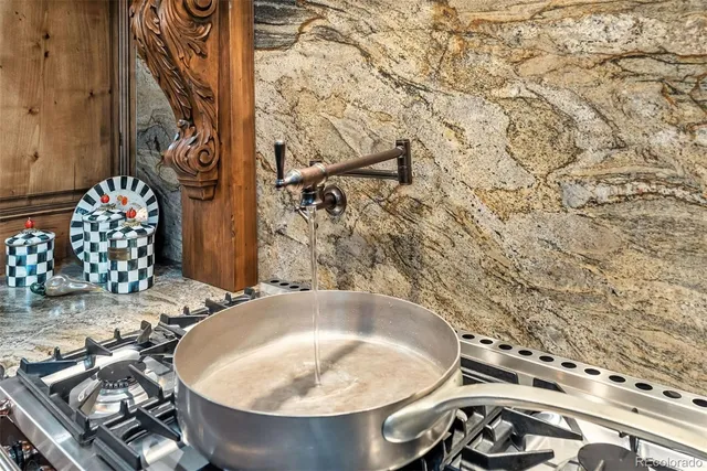 a kitchen that has a lot of cabinets in it