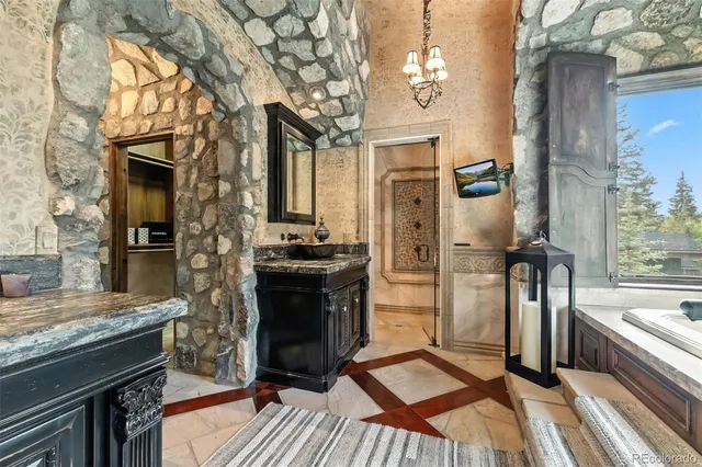 a large pool with table and chairs