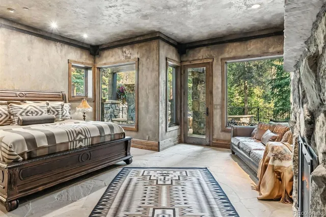 a bathroom with a tub and shower