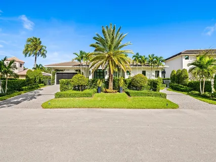 a view of a house with a street