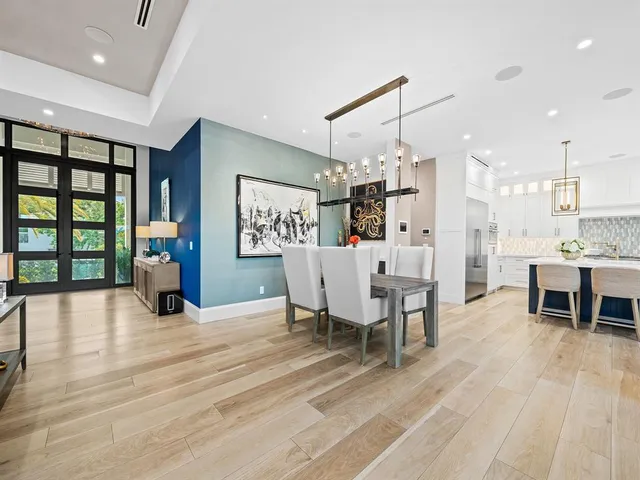 a bathroom with a black white checkered floor