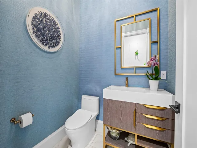 a view of a livingroom with furniture and window