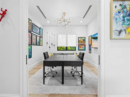 a view of a livingroom with furniture and window