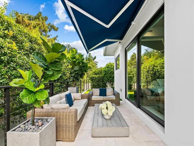 a spacious bathroom with a double vanity sink a mirror and a shower