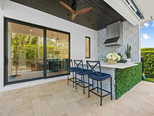 a view of swimming pool with seating space