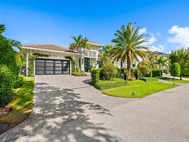 an aerial view of houses with outdoor space