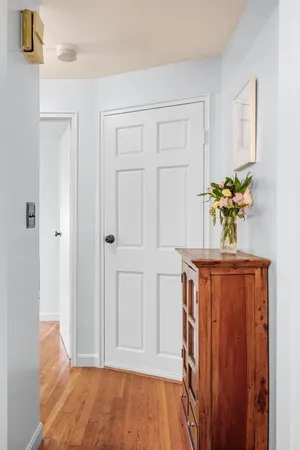 a view of entryway with wooden floor