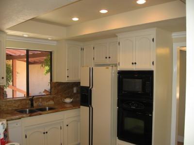 110 Rametto Road Montecito, CA 93108 - Photo 4 of 8 a kitchen with a refrigerator and cabinets