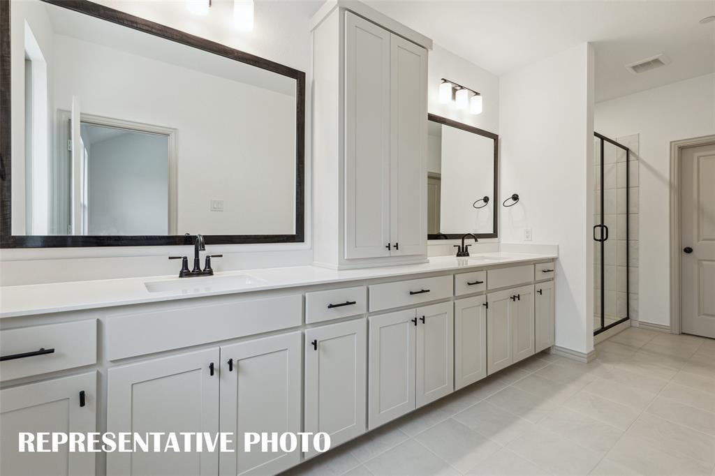 220 Dylan Way Midlothian, TX 76065 - Photo 7 of 16 Plenty of space for two in this wonderful owner's bath. REPRESENTATIVE PHOTO