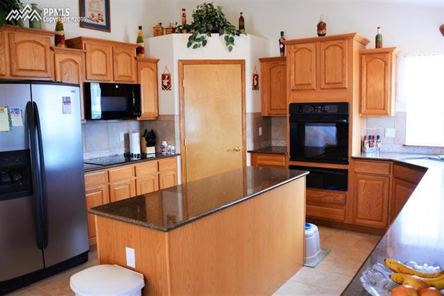 9023 Rockingham Drive Peyton, CO 80831 - Photo 9 of 17 Gallery Image 9
