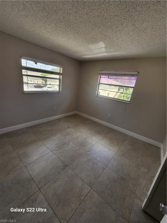 3325 Airport Road North, Unit N8 Naples, FL 34105 - Photo 11 of 22 a view of an empty room with a window
