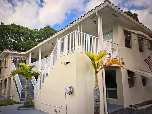 a view of a house with a white door