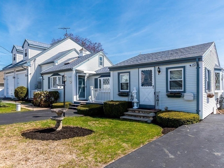26 Washington Drive Wareham, MA 02571 - Photo 1 of 42 a front view of a house with a yard