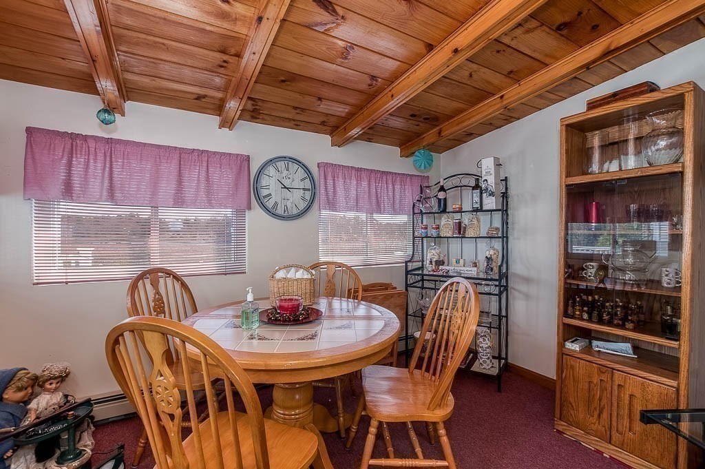 26 Washington Drive Wareham, MA 02571 - Photo 11 of 42 a view of a dining table and chairs in a room