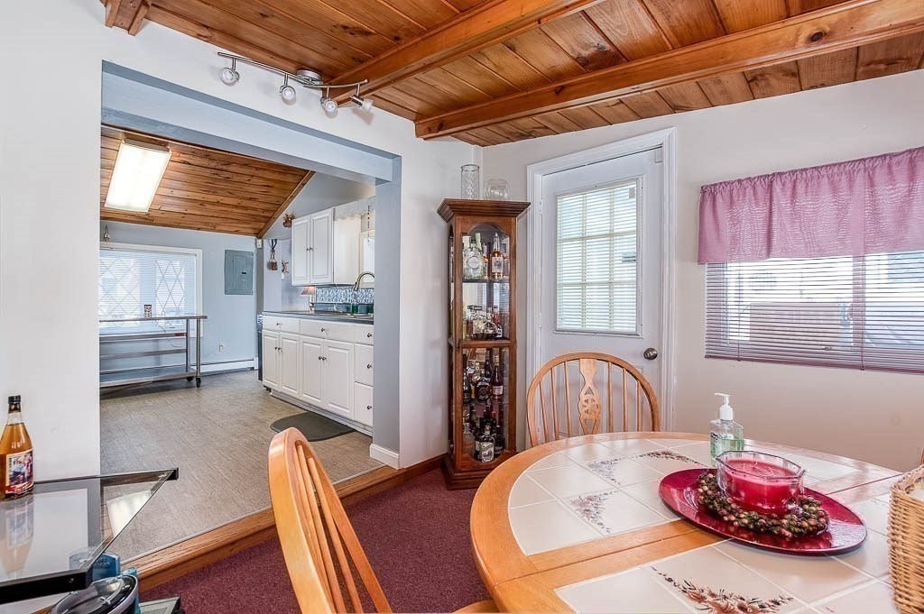 26 Washington Drive Wareham, MA 02571 - Photo 12 of 42 a kitchen with a stove and a refrigerator